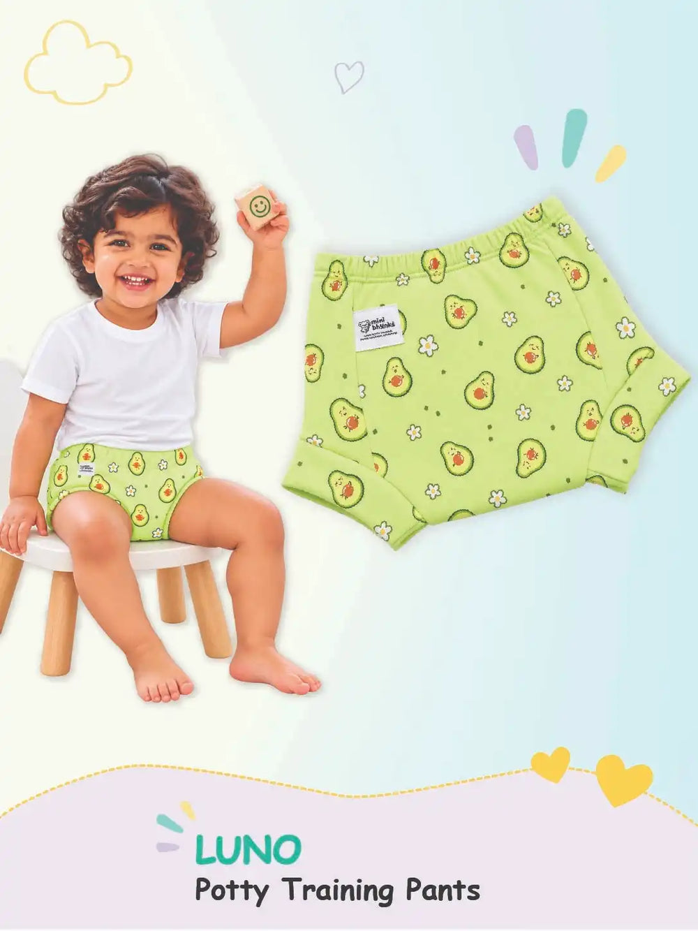 Child in avocado flower LUNO potty training pants on a stool next to a matching flat-lay pair.