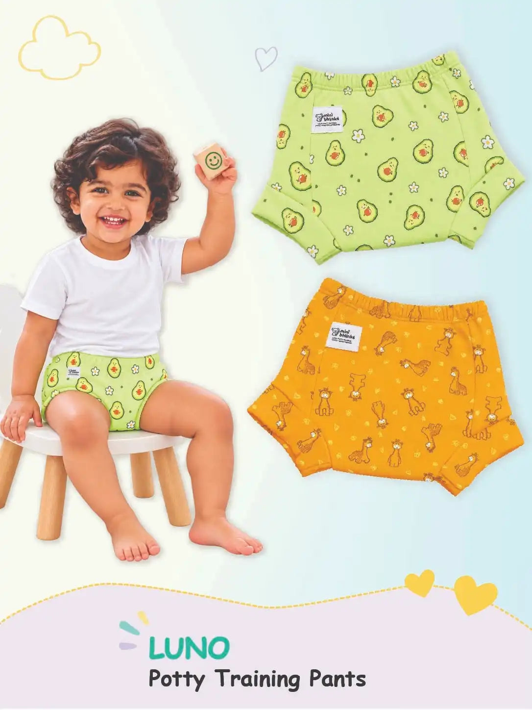 Child in avocado-print LUNO potty training pants on a stool next to flat-lay Giraffe and Avocado pairs.