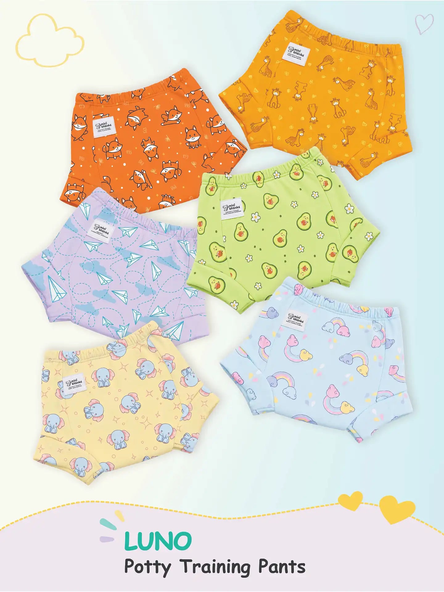 Six patterned LUNO potty training pants displayed in a flat lay featuring fox, giraffe, avocado, and rainbow prints