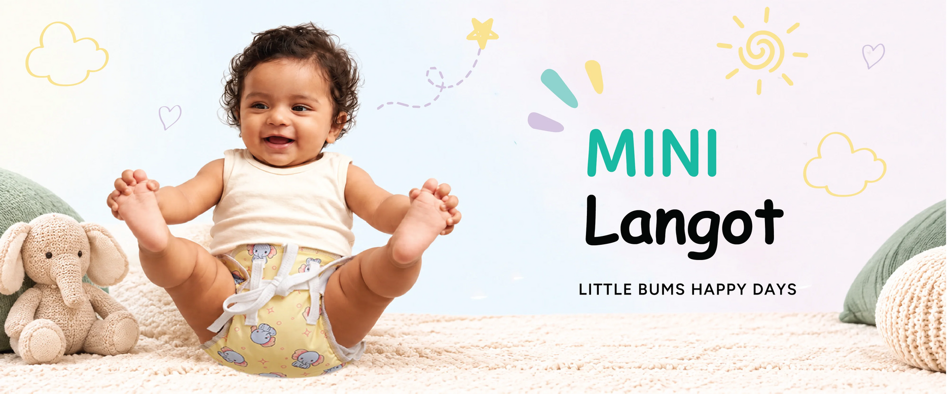 Smiling baby in a yellow elephant print Mini Langot under Little Bums Happy Days text banner